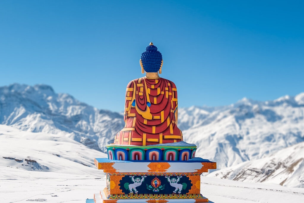 horizontal shot of buddha statue in langza village. spiti valley in winter